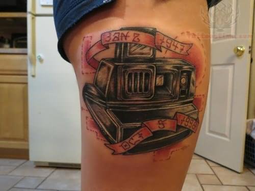 Old Movie Camera With Banner Tattoo On Side Thigh