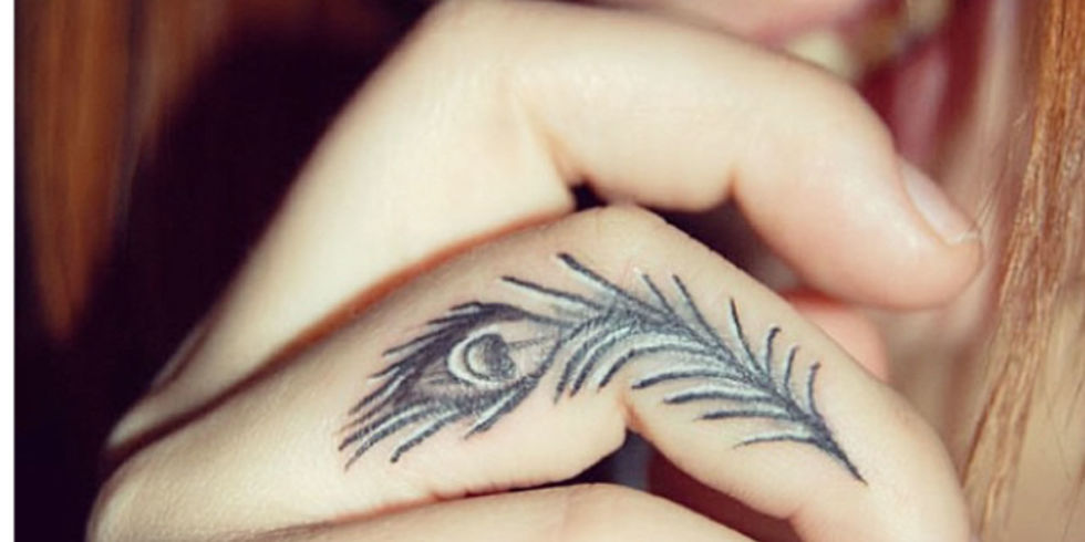 Peacock Feather Tattoo On Finger