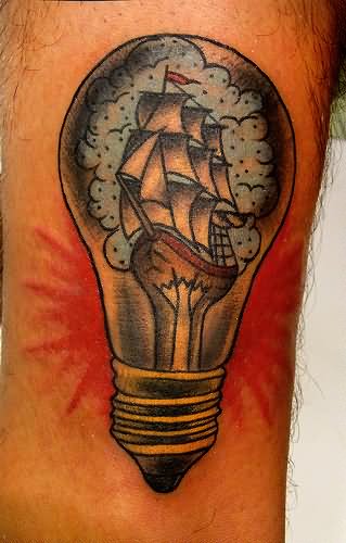 Pirate Ship In Bulb Tattoo On Inner Bicep