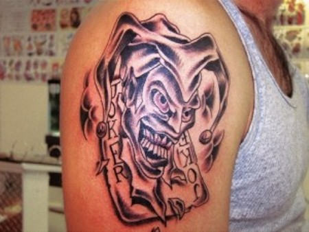 Playing Cards With Jester Clown Tattoo On Shoulder