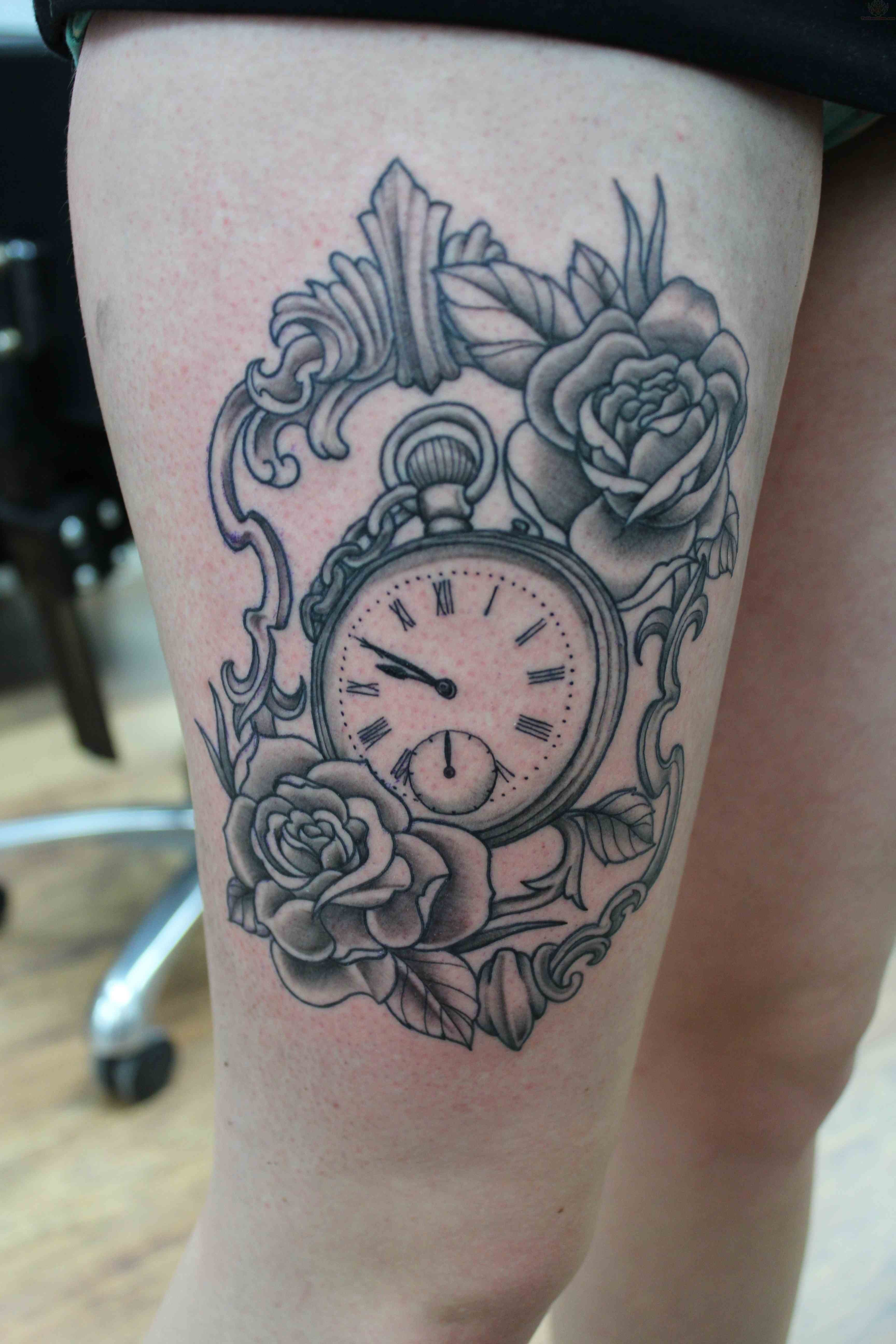 Pocket Watch In Frame With Roses Tattoo On Thigh
