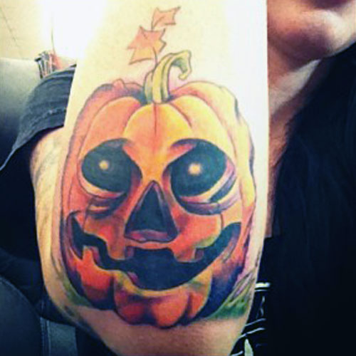 Pumpkin Tattoo On Right Arm For Girls