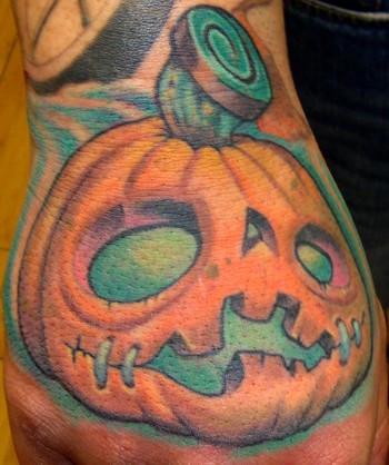 Pumpkin Tattoo On Right Hand