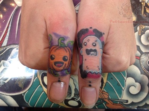 Pumpkin Tattoo On Thumb For Girls