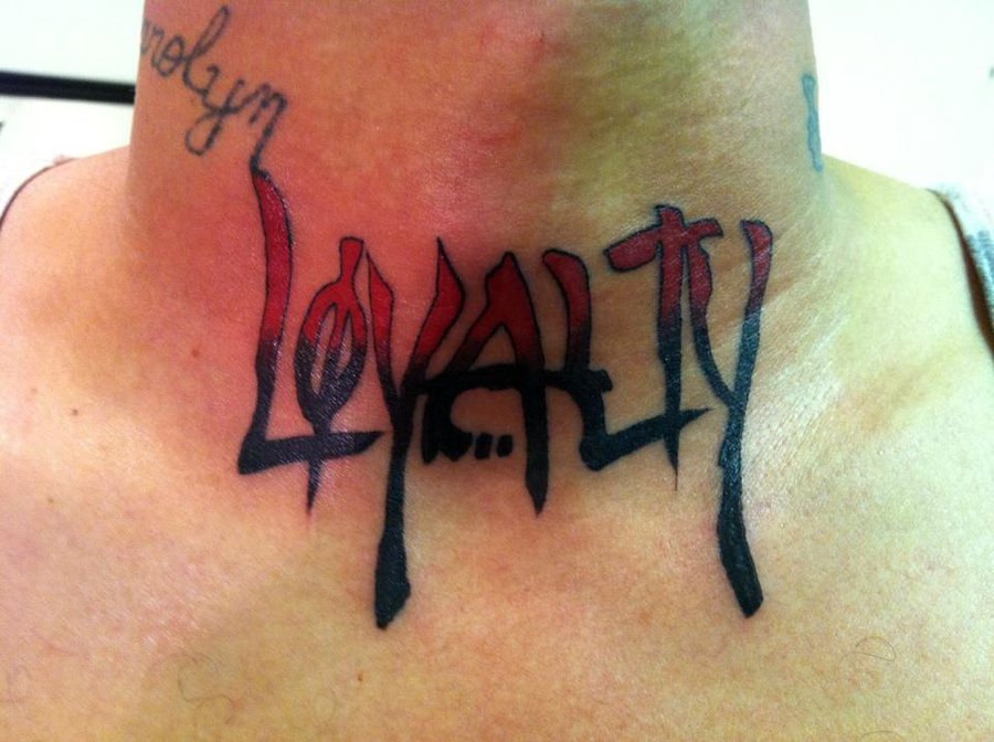 Red And Black Ink Loyalty Tattoo On Throat