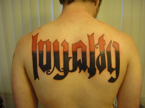 Red And Black Ink Loyalty Tattoo On Upper Back