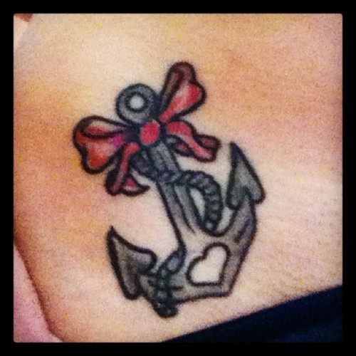 Red Bow In Anchor Tattoo On Hip