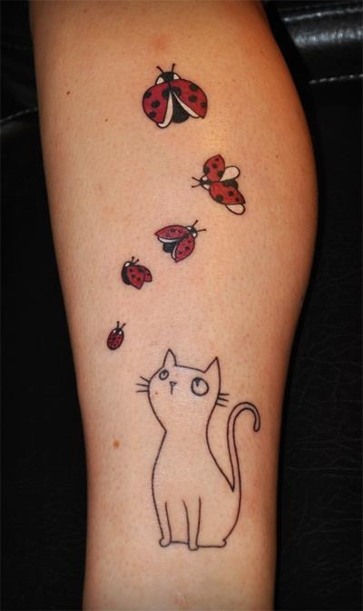 Red Ladybugs And Outline Cat Tattoo On Leg