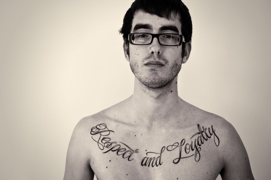 Respect And Loyalty Tattoo On Man Chest