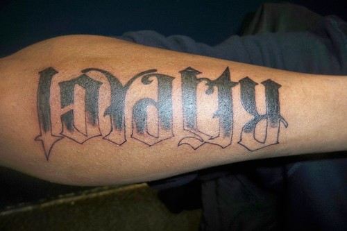 Respect Loyalty Ambigram Tattoo On Right Arm