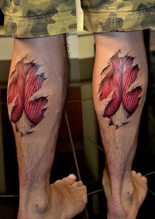 Ripped Skin Muscle Tattoo On Leg Calf