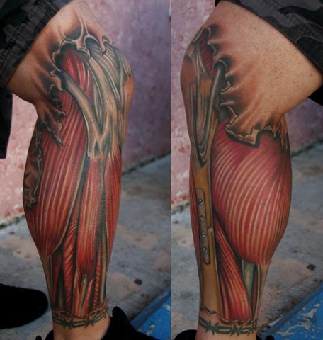 Ripped Skin Muscle Tattoo On Leg