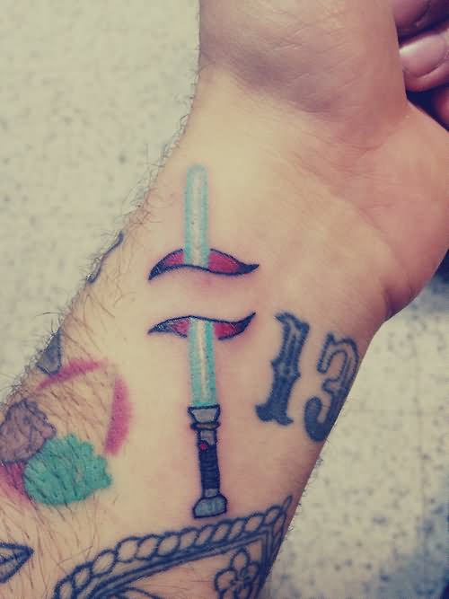 Ripped Skin Star War Lightsaber Tattoo On Wrist