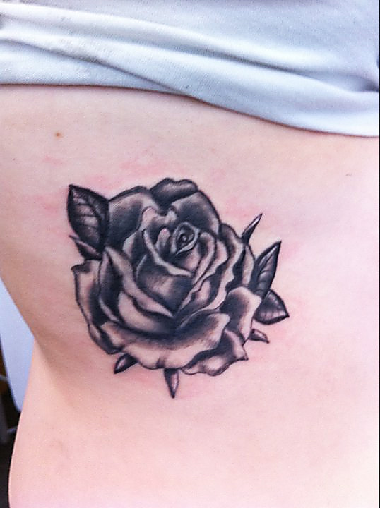 Rose Black And White Tattoo On Side Rib