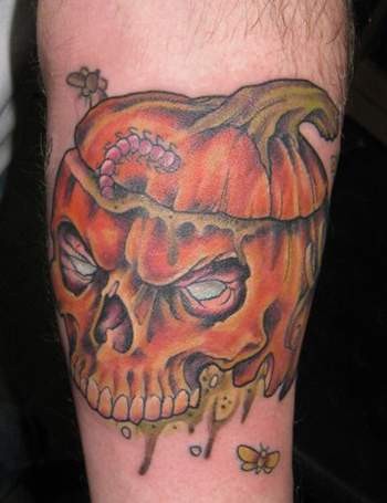 Rotten Pumpkin Skull Tattoo On Arm