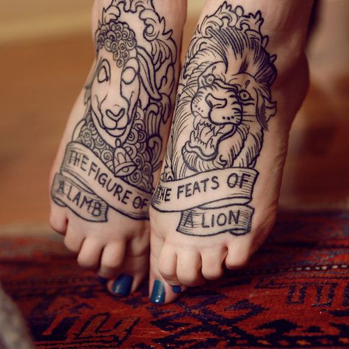 Sheep And Lion Head With Banner Tattoo On Girl Feet