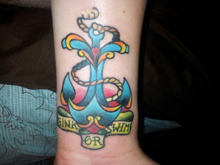 Sink Or Swim Banner With Blue Anchor Tattoo On Forearm