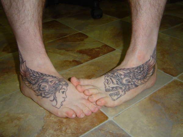 Skull And Girl Head Tattoo On Feet