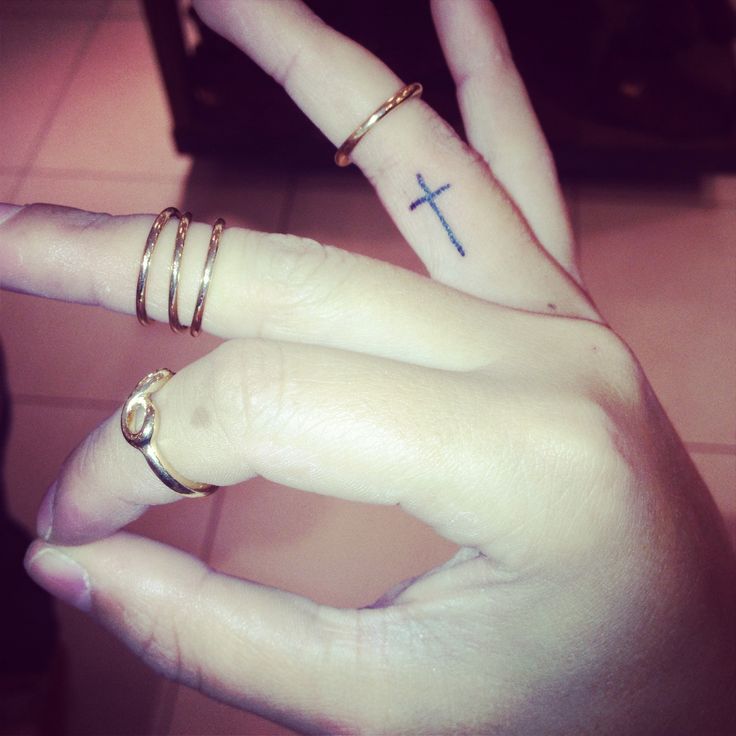 Small Cross Tattoo On Finger For Girls