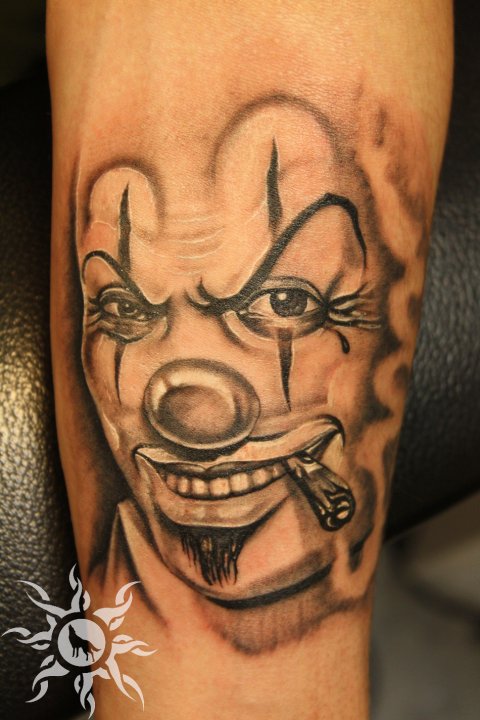 Smoking Clown Head Tattoo Design For Arm