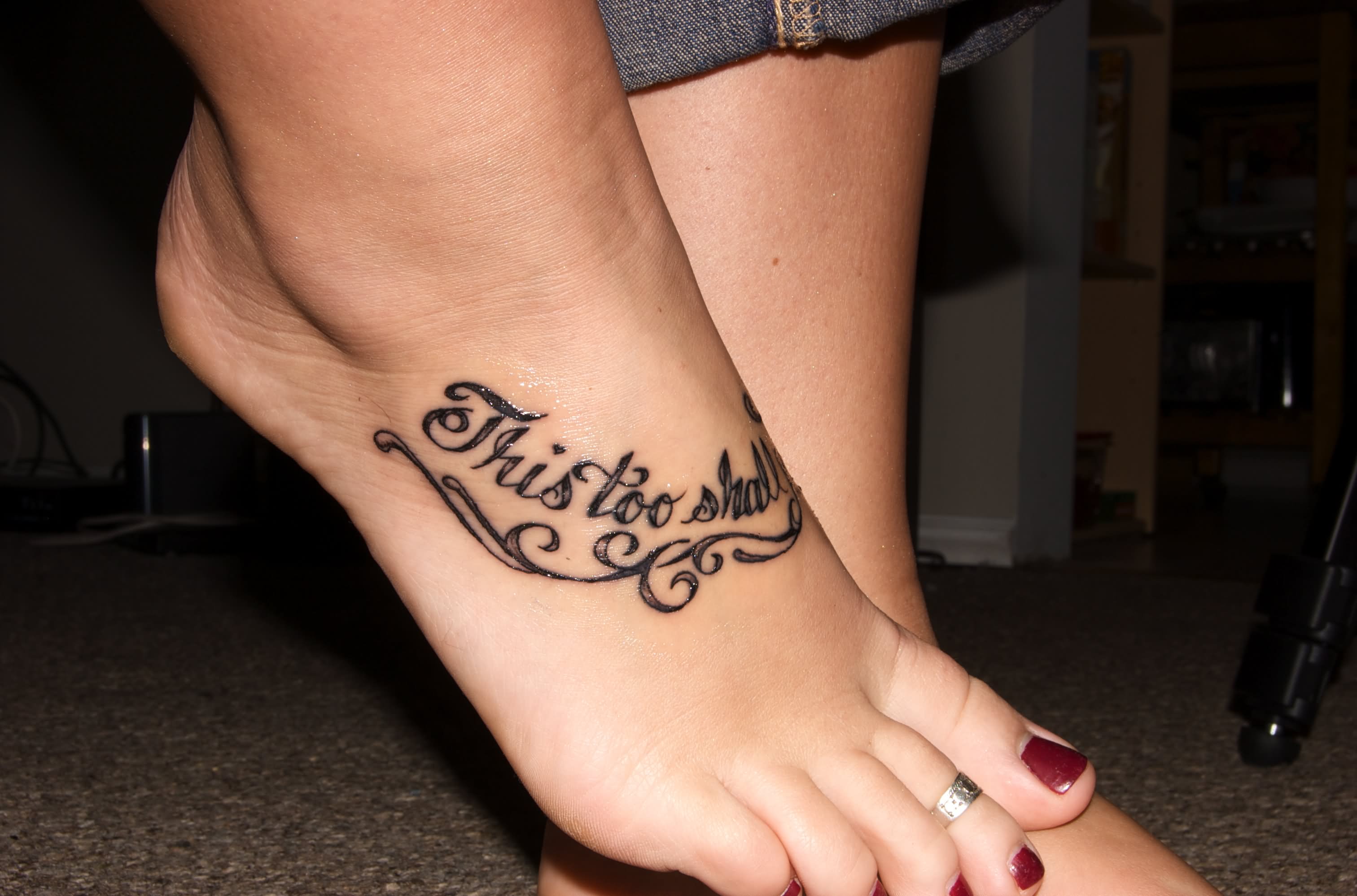 This Too Shall Pass Lettering Tattoo On Girl Foot