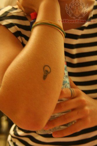 Tiny Bulb Tattoo On Right Arm