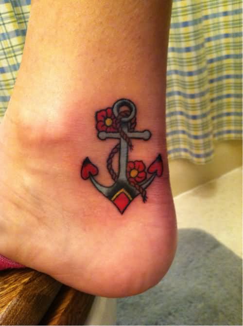 Traditional Flowers And Anchor Tattoo On Foot