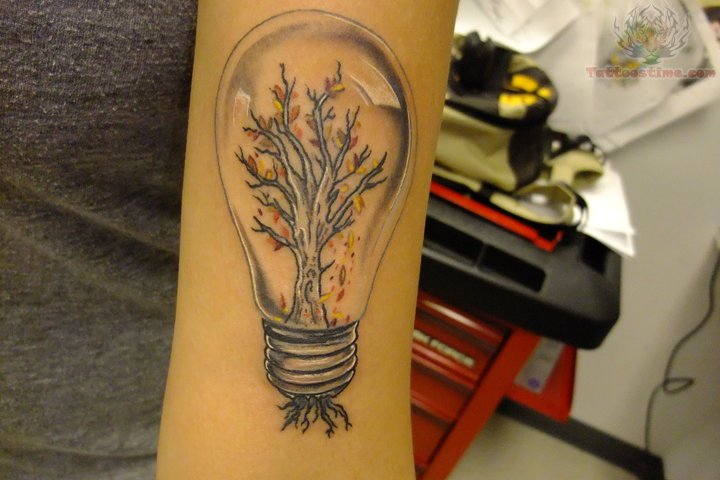 Tree In Bulb Tattoo On Bicep For Girls