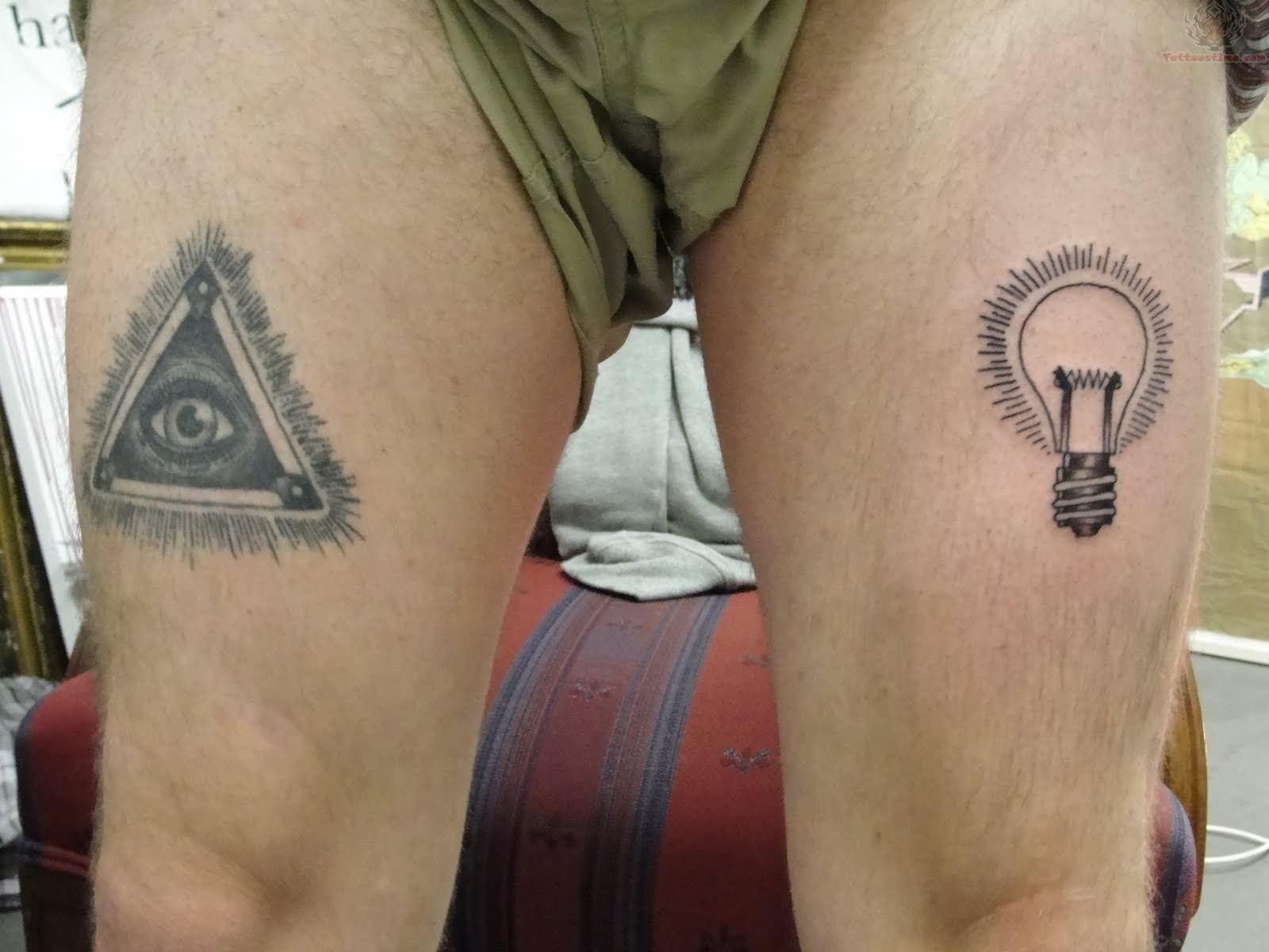 Triangle Eye And Bulb Tattoos On Both Thigh