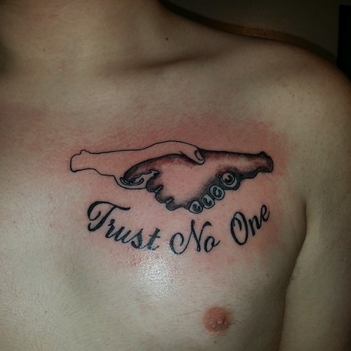 Trust No One Tattoo On Chest For Men