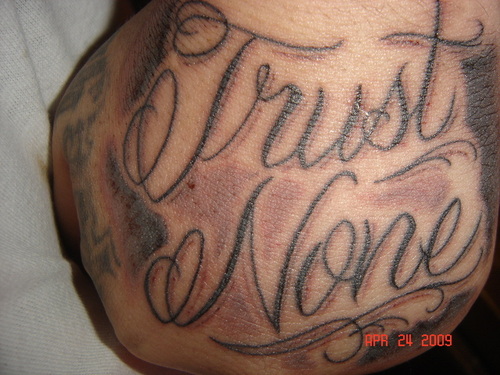 Trust No One Tattoo On Hand