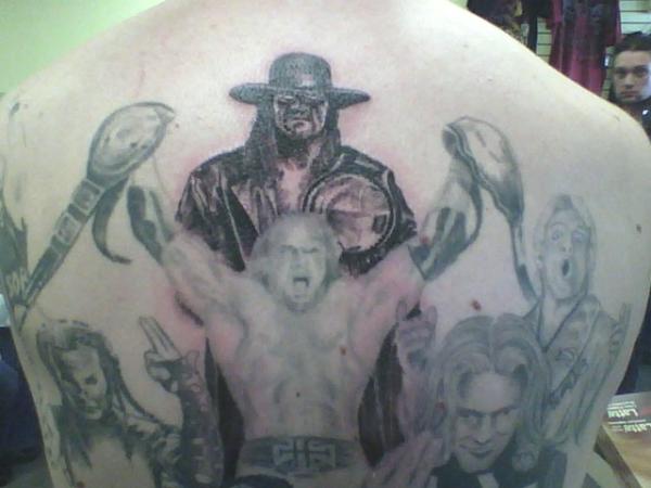 Undertaker And Triple H Wrestler Tattoo Man Upper Back.