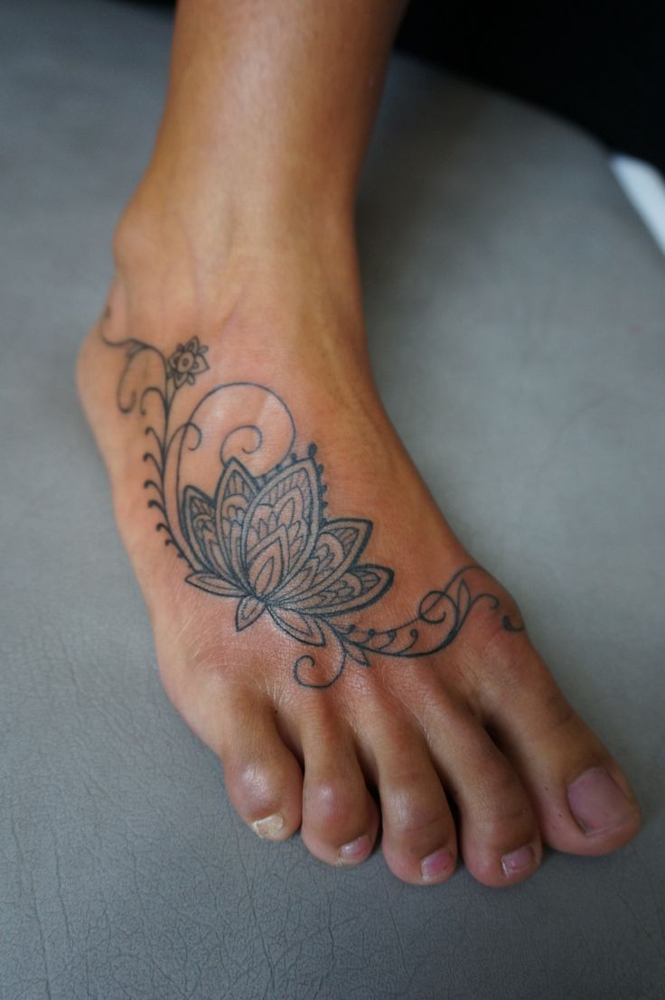 Unique Lotus Flowers Tattoo On Foot