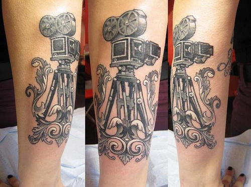 Unique Movie Camera Tattoo On Forearm