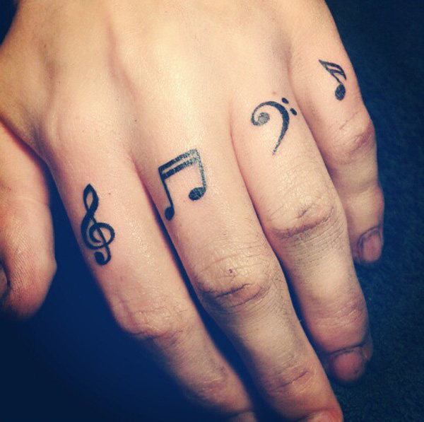 Violin Key And Music Note Tattoo On Fingers