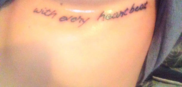 With Every Heartbeat Lettering Tattoo On Under Breast