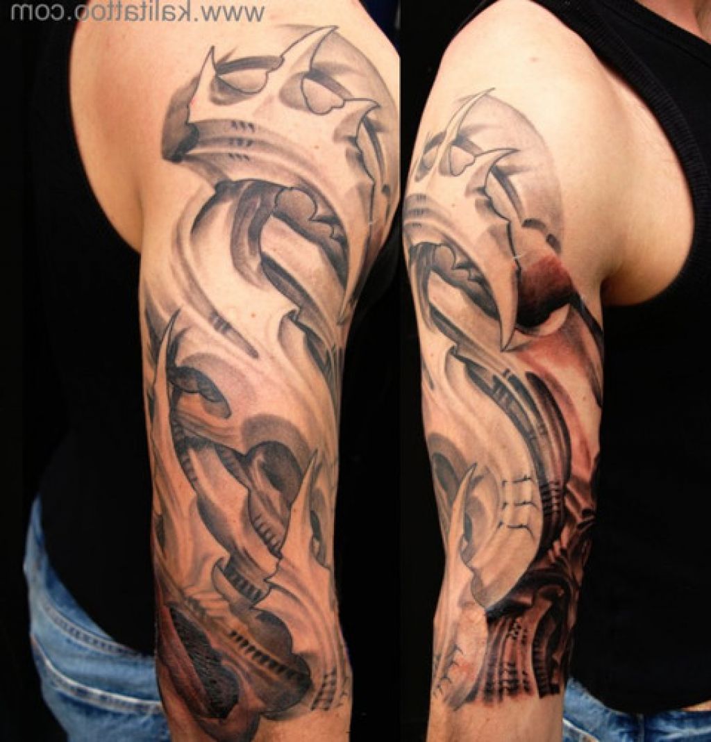 Wonderful Black And Grey Ripped Skin Muscle Tattoo On Half Sleeve