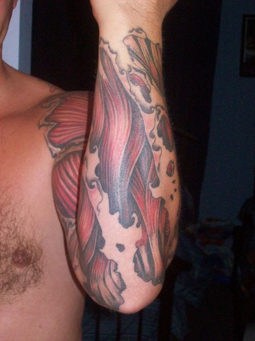 Wonderful Ripped Skin Muscle Tattoo On Man Left Full Sleeve