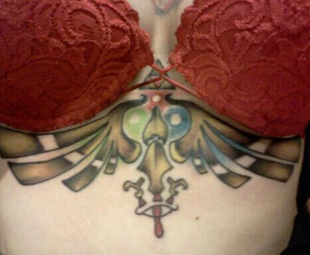 Zelda Triforce Tattoo On Under Breast