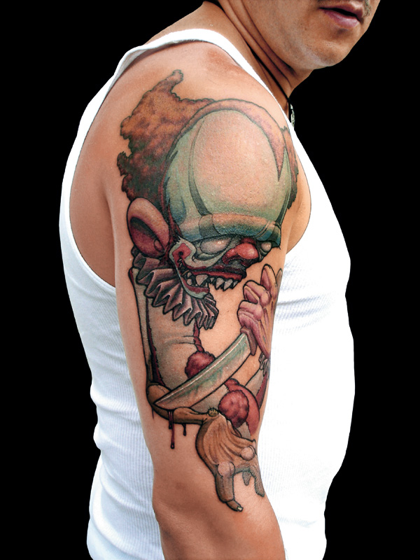 Zombie Clown Tattoo On Man Right Half Sleeve