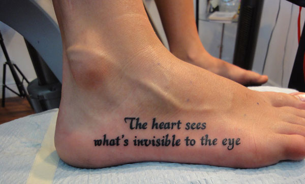 the Heart Sees What's Invivible To The Eye Lettering Tattoo On Foot