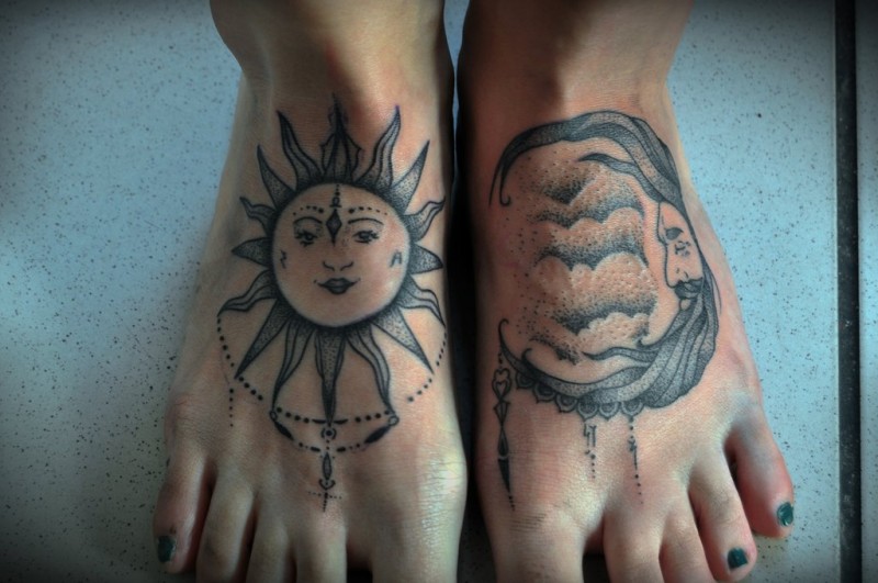 Amazing Sun And Half Moon Face Tattoo On Feet