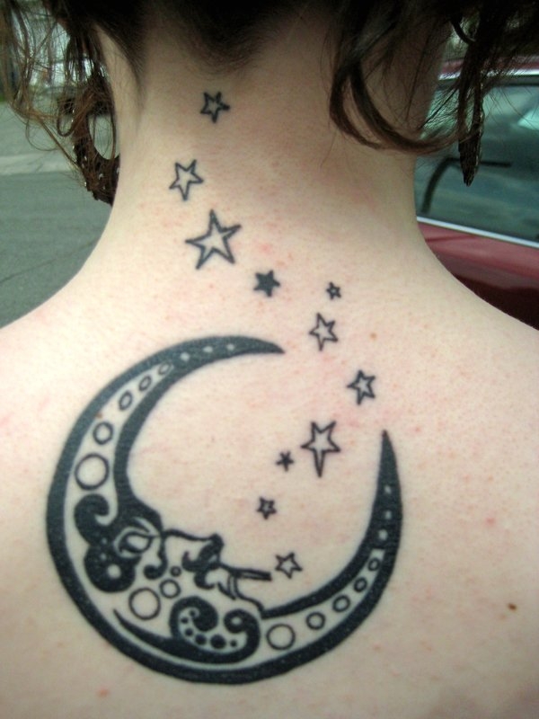 Awesome Black Half Moon Face With Stars Tattoo On Girl Upper Back