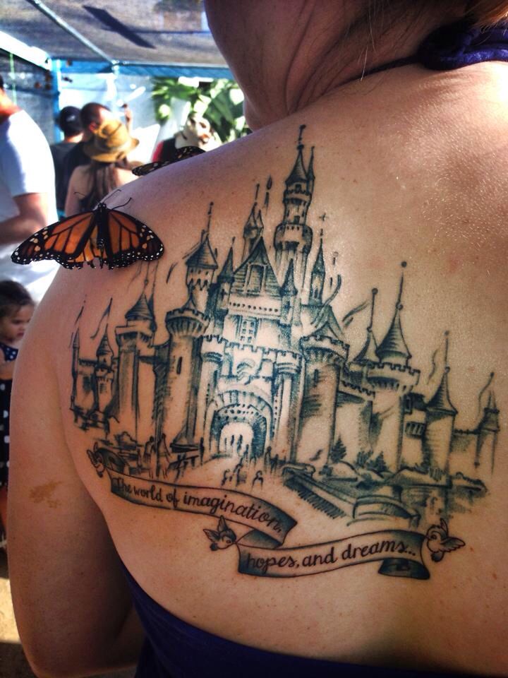 Awesome Black Ink Castle With Banner Tattoo On Left Back Shoulder