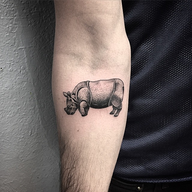 Black And Grey 3D Rhino Tattoo On Forearm