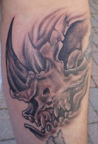 Black And Grey Rhino Skull Tattoo Design