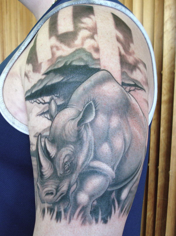 Black And Grey Rhino Tattoo On Left Half Sleeve By Nelson Daboud