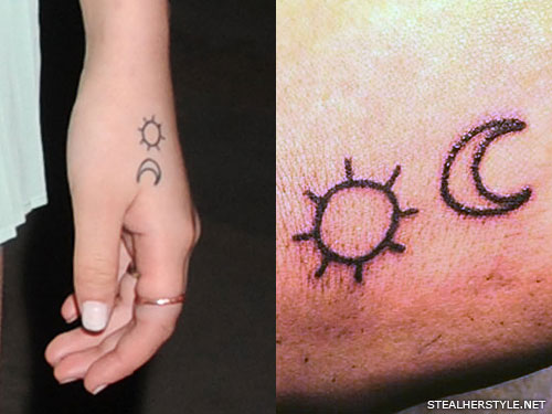 Black Outline Sun With Half Moon Tattoo On Girl Hand
