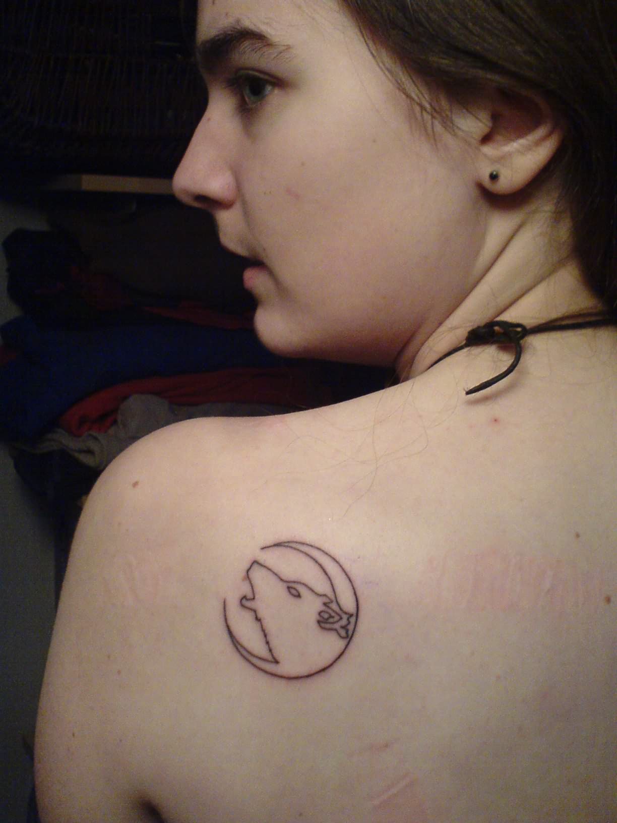 Black Outline Wolf Head With Half Moon Tattoo On Girl Left Back Shoulder
