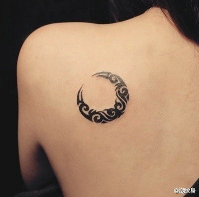 Black Tribal Half Moon Tattoo On Girl Left Back Shoulder